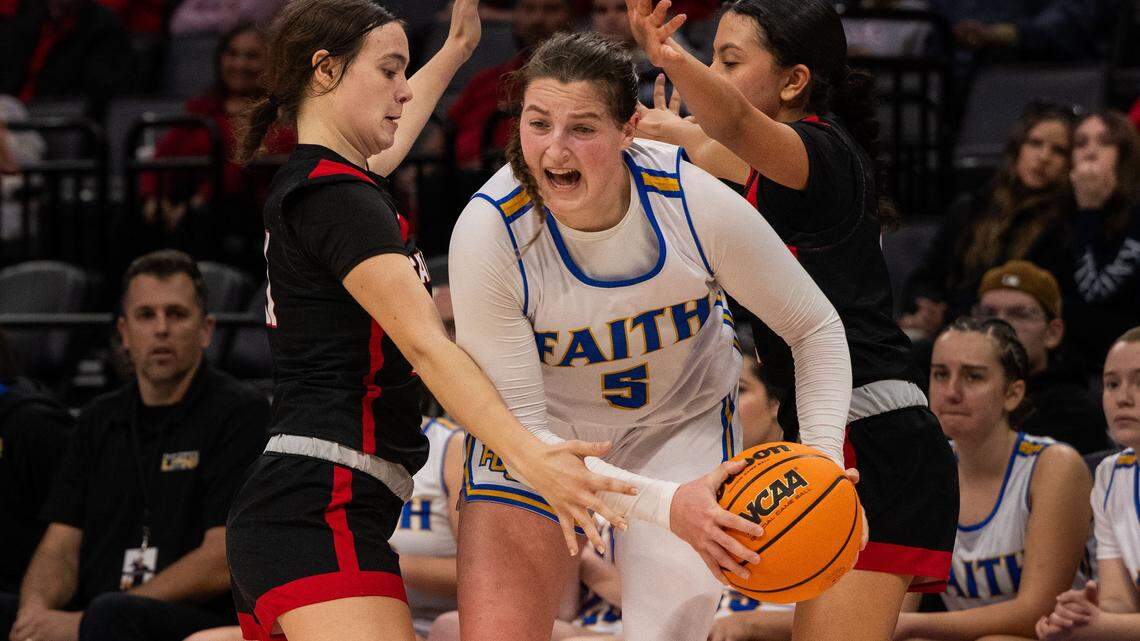 The Faith Christian Lions’ Lauren Harris (5) is defended by the Sacramento Adventist Capitals’ Kyla Friedrich (21) and Jasmine Rodriguez (2) during the 2025 CIF Sac-Joaquin Section Division VI girls basketball championship game at Golden 1 Center.