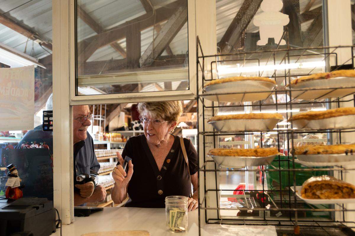 Nick and Donna Roenick of Placerville buy pies at Abel’s Apple Acres, a member of the Apple Hill Growers Association, on Friday, Sept. 3, 2021 in El Dorado County.