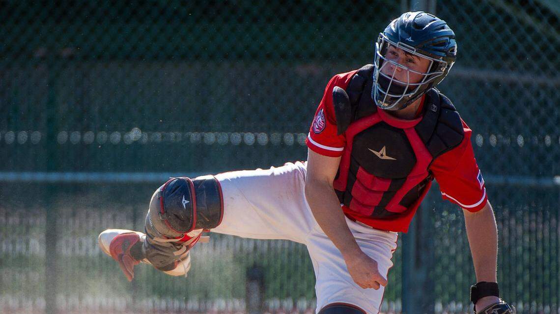 Mcclatchy High School catcher Malcolm Moore throws ball to second base during a game at McClatchy High School against Ponderosa on Tuesday, April 27, 2021. Moore is batting .500 with 25 extra-base hits and 45 RBIs