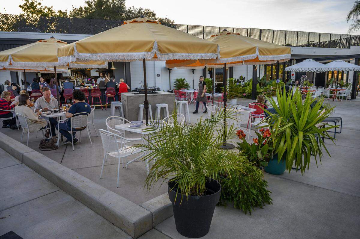 The outdoor space at Shangri-La in Fair Oaks includes a bar and dinning area full of people on Tuesday Oct.15, 2019.
