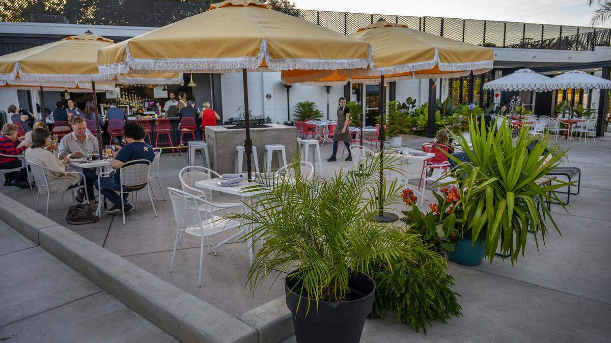 The outdoor space at Shangri-La in Fair Oaks includes a bar and dinning area full of people on Tuesday Oct.15, 2019.