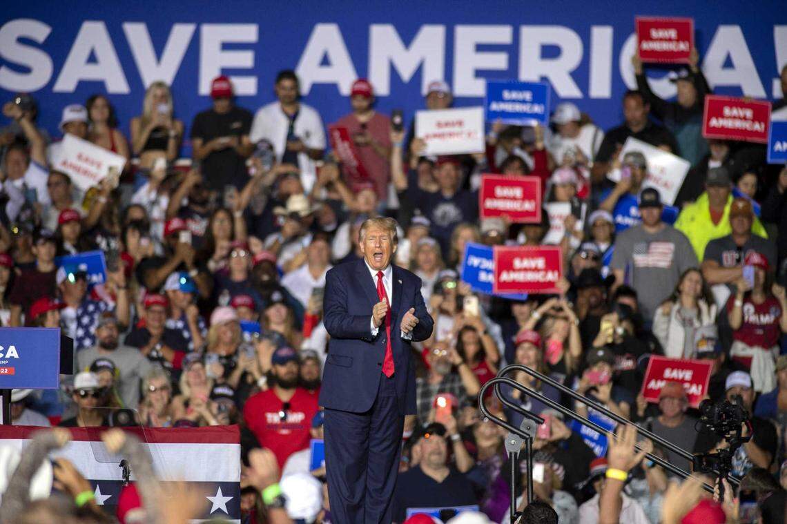 Former President Donald Trump applauds while speaking at a rally at the Minden Tahoe Airport in Minden, Nevada, in October 2022. Trump’s visit to stump for Republican candidates was the closest he has come to California since he left office.