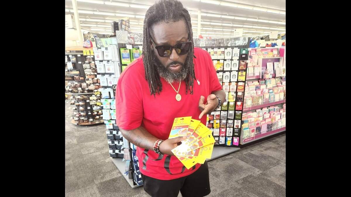 Voice of the Youth founder, Berry Accius, prepared to purchase gas cards for his beloved community. June 20, 2022