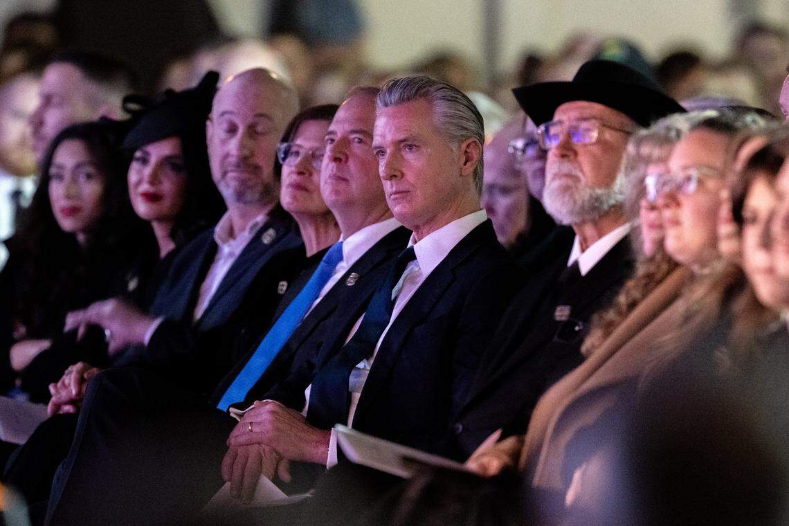 Gov. Gavin Newsom and Sen. Adam Schiff attend the memorial service for Rep. Doug LaMalfa at the Silver Dollar Fairgrounds in Chico on Saturday.