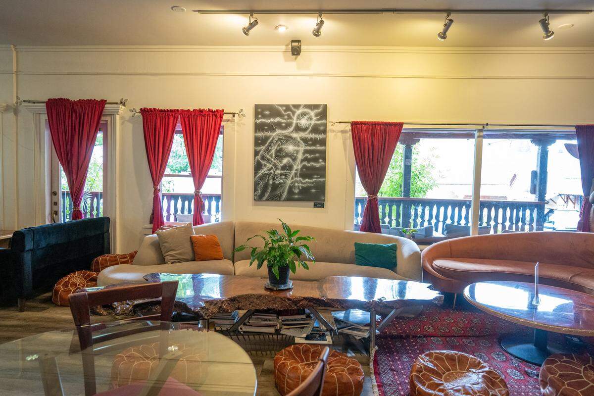 Comfortable sofas, tables and artwork decorate the inside of Elixart in Nevada City on Thursday, May 28, 2026.