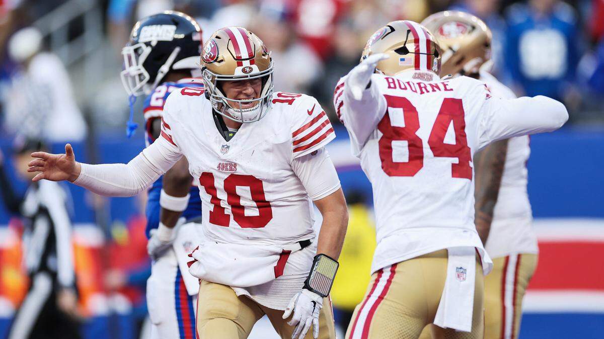 San Francisco 49ers quarterback Mac Jones (10) celebrates with Kendrick Bourne (84) after a touchdown against the New York Giants during the fourth quarter at MetLife Stadium on Nov. 2 in East Rutherford, N.J.