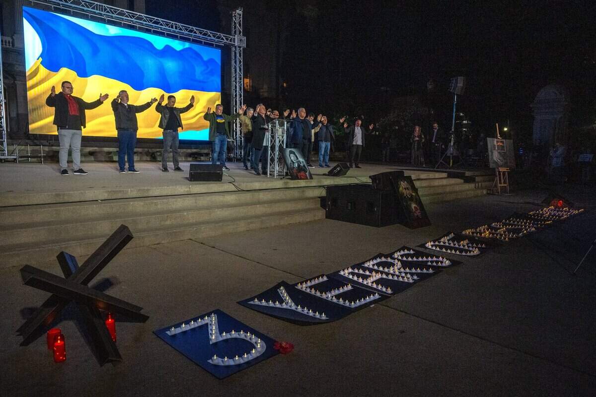 Pastors ask the crowd to pray for peace and continued solidarity between the United States and Ukraine on Monday. The gathering marked the third anniversary of Russia’s invasion of the country.