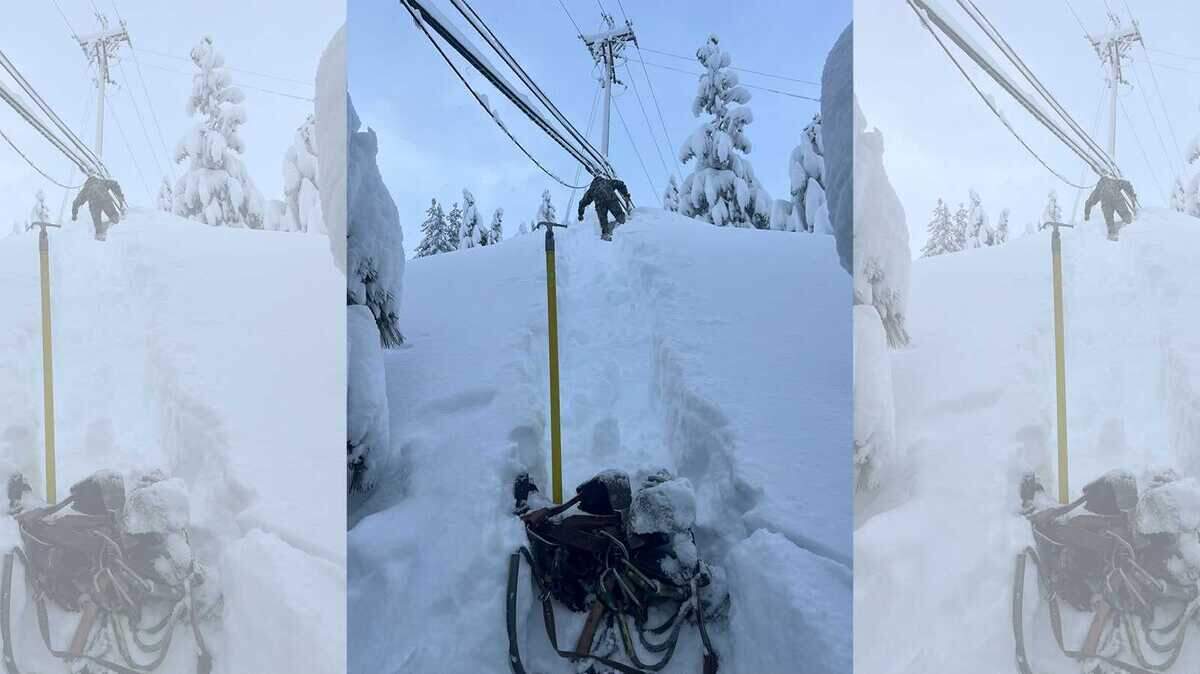 A lineman climbs a mound of fresh snow in the South Lake Tahoe area on Sunday, Dec. 11, 2022, following a widespread power outage in the basin due to heavy snow and winds from a powerful winter storm. About 6,000 customers remained without power Monday.