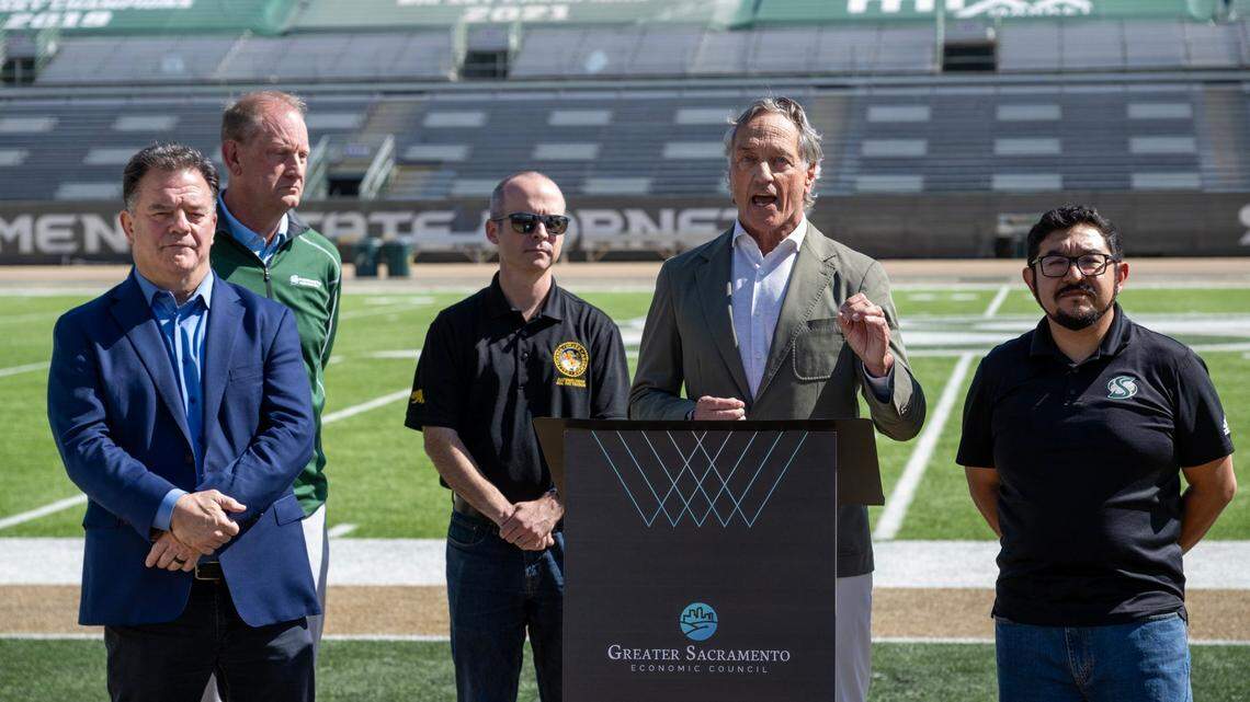 Real estate developer Mark Friedman speaks at a press conference at Sacramento State’s Hornet Stadium on Friday with other business and political leaders in support of the school moving to a Football Bowl Subdivision conference. He was joined by the Greater Sacramento Economic Council’s Barry Broome, the California Manufacturers & Technology Association’s Lance Hastings, Assemblyman Joe Patterson and City Councilman Eric Guerra.