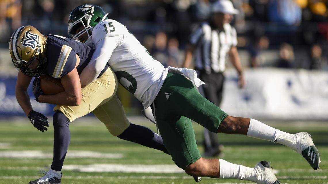 Sacramento State defensive back Marte Mapu takes down Montana State’s Coy Steel in a 2019 football game.