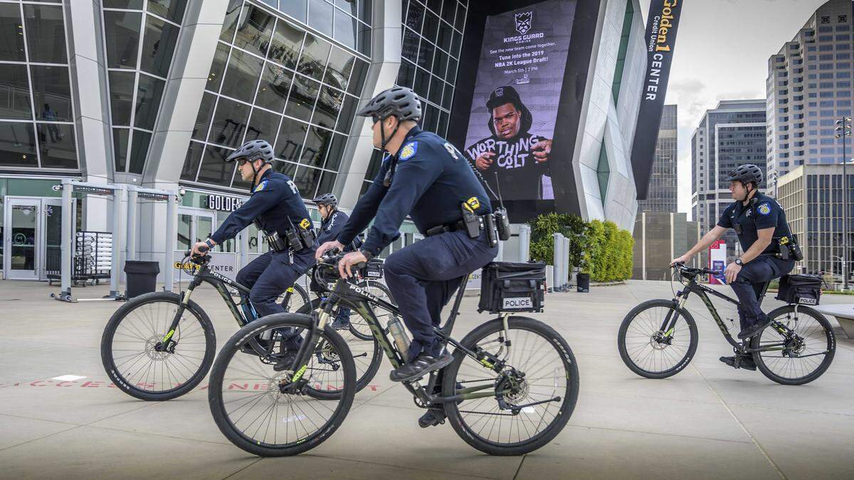 Sacramento Police officers ride bicycles near Golden 1 Center in Sacramento on March 4, 2019. The department has opened a new Bike Unit substation in Downtown Commons to strengthen its patrol presence in the DoCo entertainment district and surrounding downtown areas.