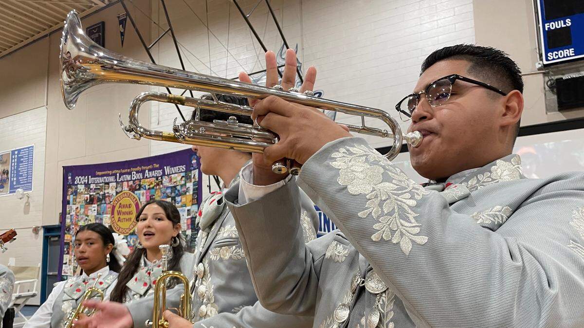 Rayan Perez, 16, of Mariachi Los Claveles, plays at the Sacramento Latino Book & Family Festival, at Valley High School, on Saturday. The Woodland-based nonprofit teaches the art of mariachi to local youth.