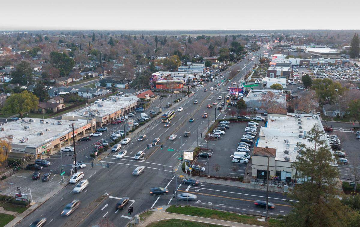 Traffic moves on Freeport Boulevard near William Land Park in Sacramento on Tuesday, Dec. 17, 2024.