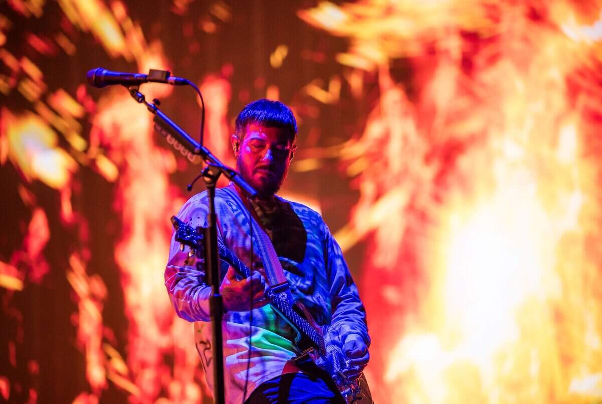 Avenged Sevenfold rhythm guitarist Zacky Vengeance performs at the Aftershock music festival in 2023. 