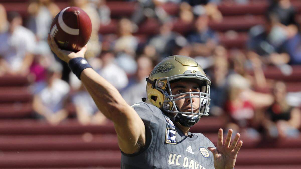 UC Davis quarterback Jake Maier, shown throwing a pass against Stanford last season, tied a school record with his 17th 300-yard game in a 41-13 victory over Lehigh on Sept. 14, 2019.