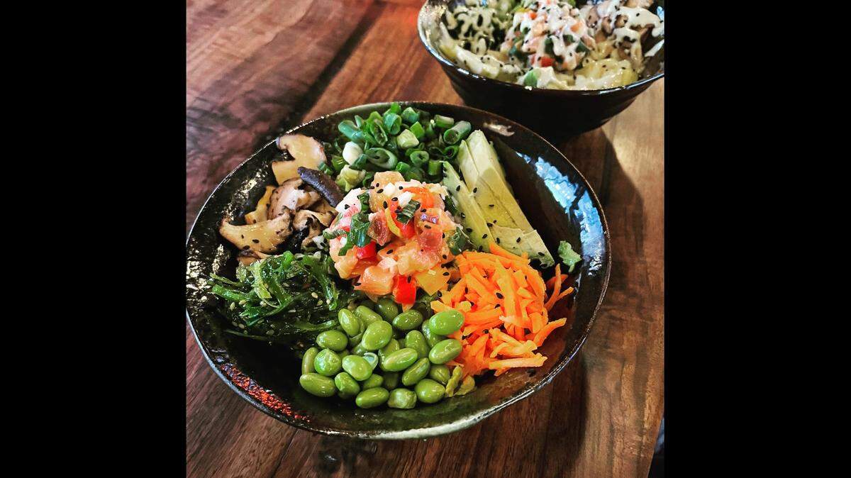 Kau Kau will serve Hawaiian-inspired dishes like this poke bowl with lomi lomi salmon.