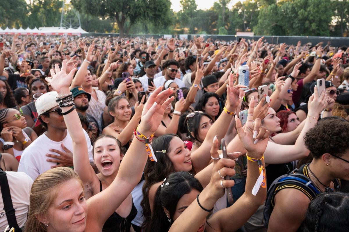 The crowd cheers as rapper Joey Bada$ performs on the first day of the Sol Blume R&B festival on Saturday, Aug. 19, 2023, at Discovery Park in Sacramento.
