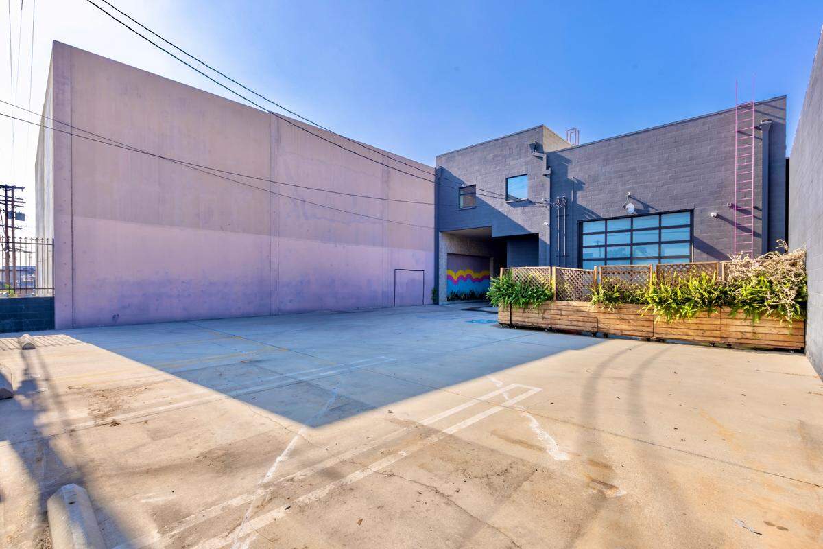 The California building offers a modern, chic​ look on the outside, and a content creator’s dream throughout the interior.