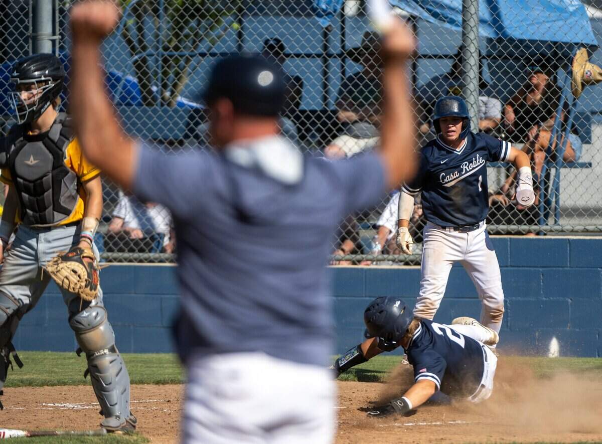 Casa Roble Rams Connor Anderson and Tyrus Vogt score on a RBI single by Cole Boyer during a CIF Sac-Joaquin Section Division IV baseball semifinal playoff game at Casa Roble High School on Thursday, May 16, 2024 in Orangevale.