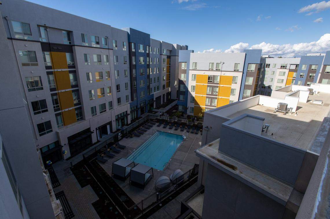 The Wexler’s pool gets some shade on Wednesday afternoon, Nov. 2, 2022, after media event to highlight the new transit-oriented student apartment complex in East Sacramento. A block from Sacramento State, the building is also next to a Regional Transit bus and light-rail stop.
