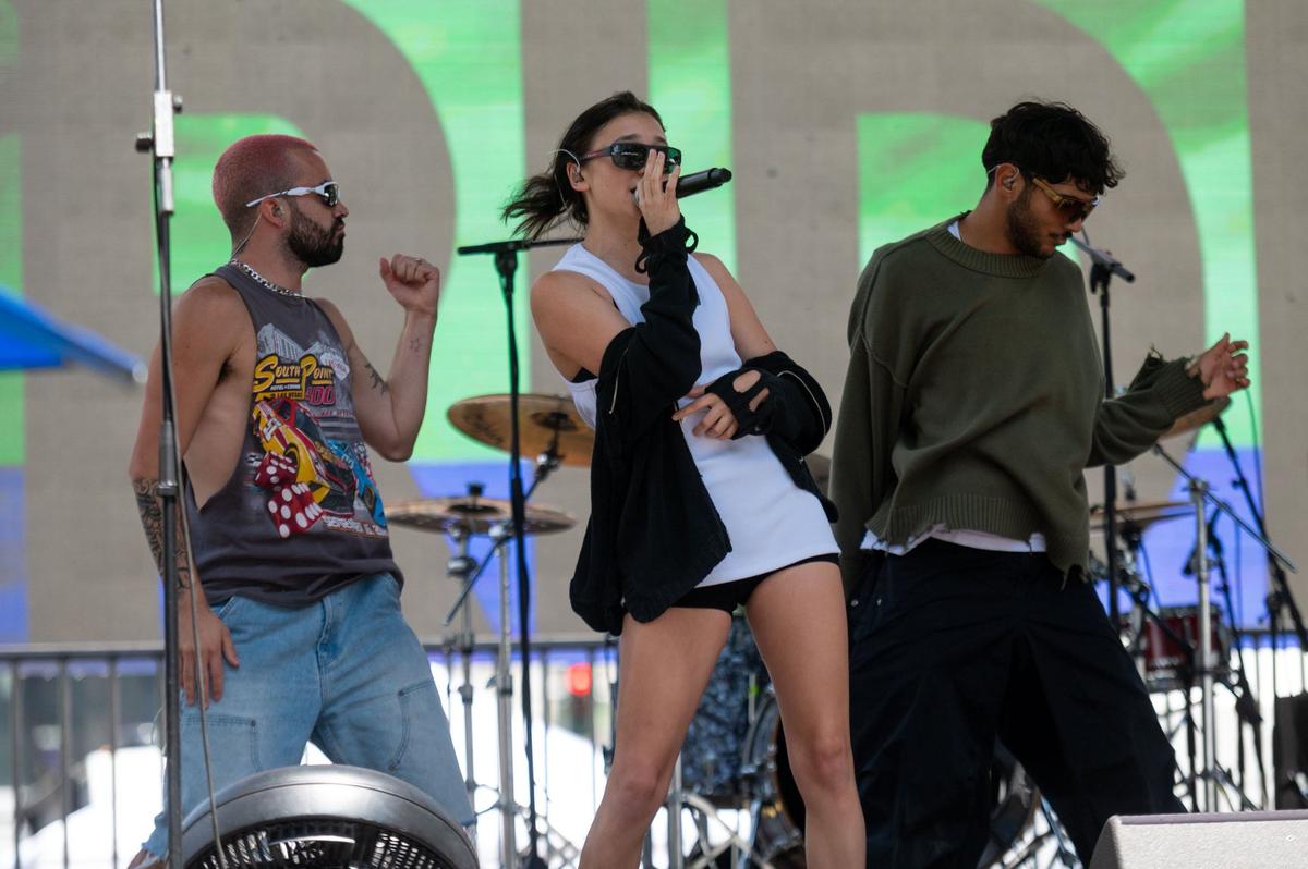 Singer-songwriter Daya checks audio at the Faces Pride Stage at the 33rd annual Sacramento Pride festival on Saturday, June 8, 2024.