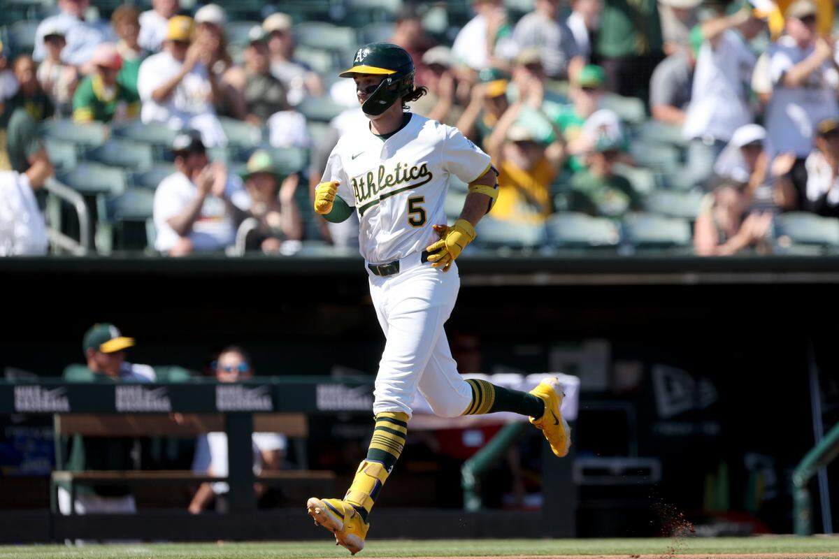 Sep 14, 2025; West Sacramento, California, USA; Athletics shortstop Jacob Wilson (5) rounds the bases after hitting a solo home run against the Cincinnati Reds during the fourth inning at Sutter Health Park. 
