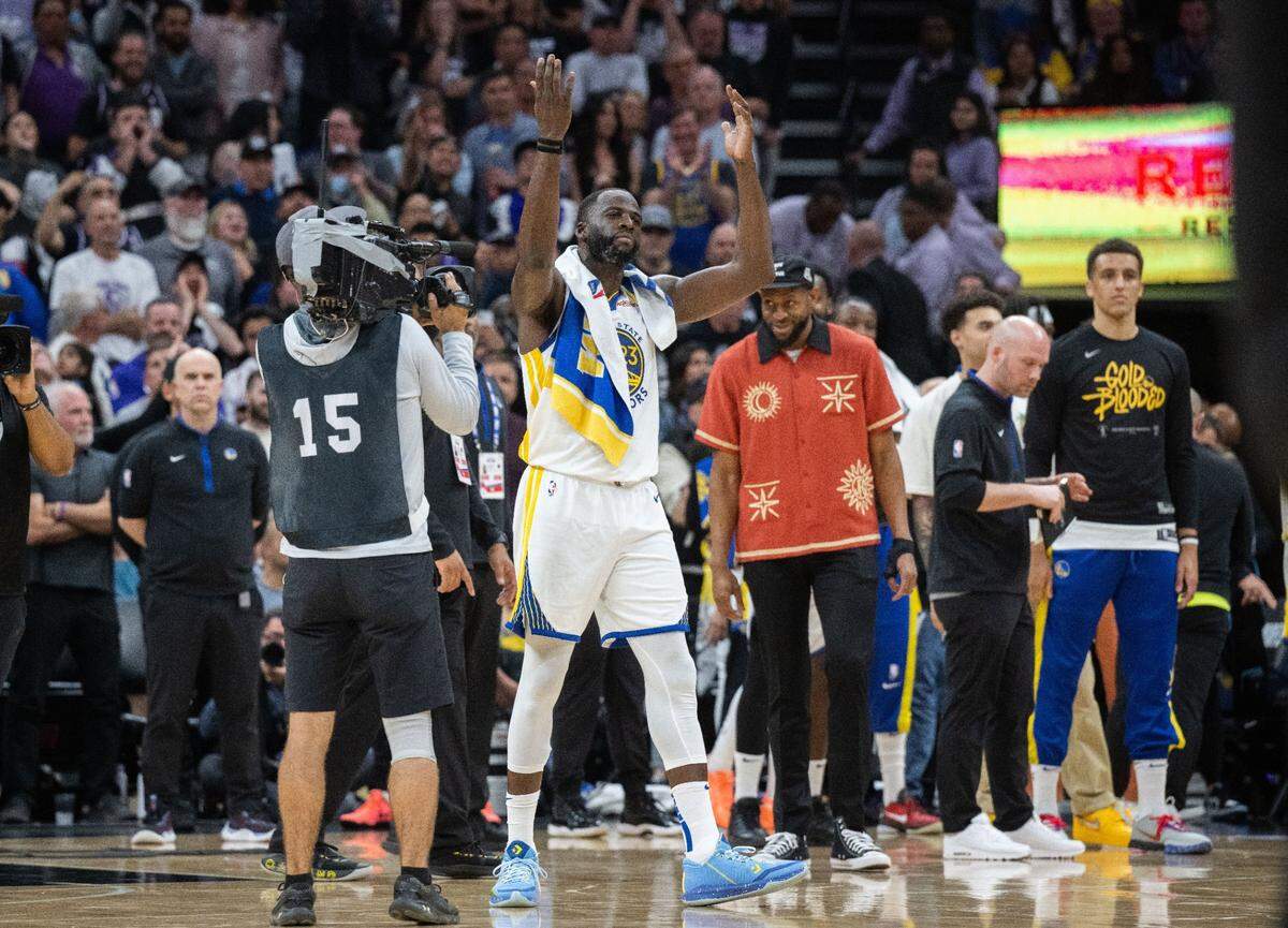 Golden State Warriors forward Draymond Green (23) incites the crowd after stomping on Sacramento Kings center Domantas Sabonis during Game 2 of the first-round NBA playoff series at Golden 1 Center on Monday, April 17, 2023. Green was issued a Flagrant 2 foul and ejected.