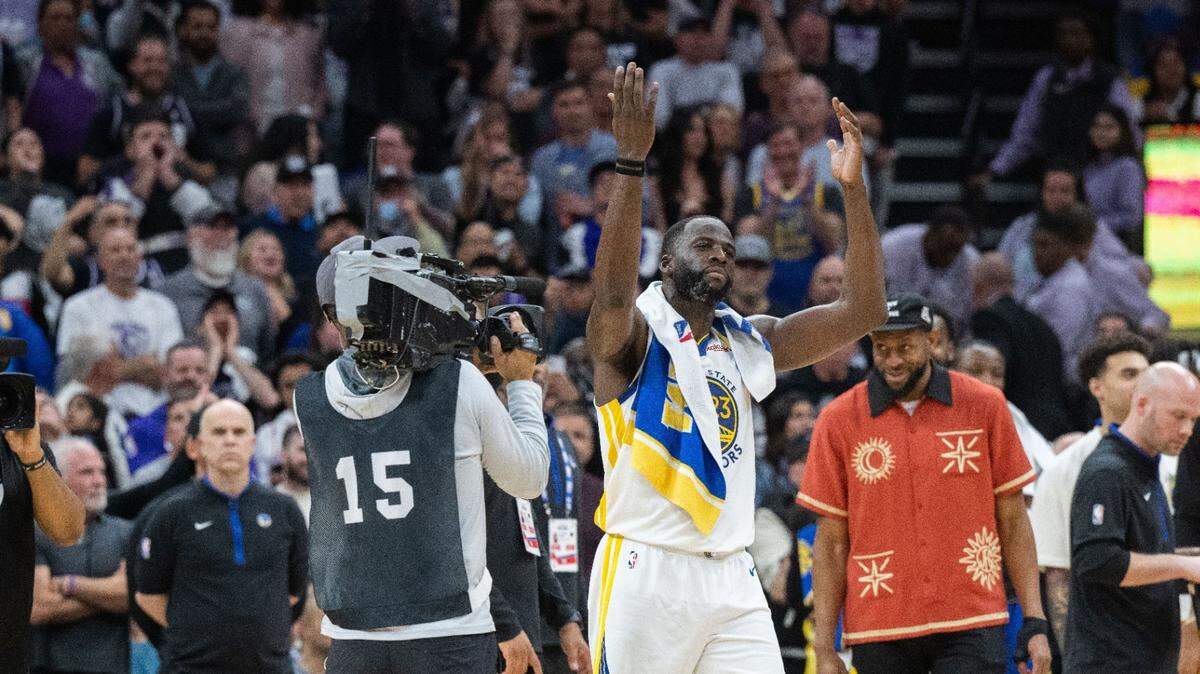 Golden State Warriors forward Draymond Green (23) incites the crowd after stomping on Sacramento Kings center Domantas Sabonis during Game 2 of the first-round NBA playoff series at Golden 1 Center on Monday. Green was issued a Flagrant 2 foul and ejected.