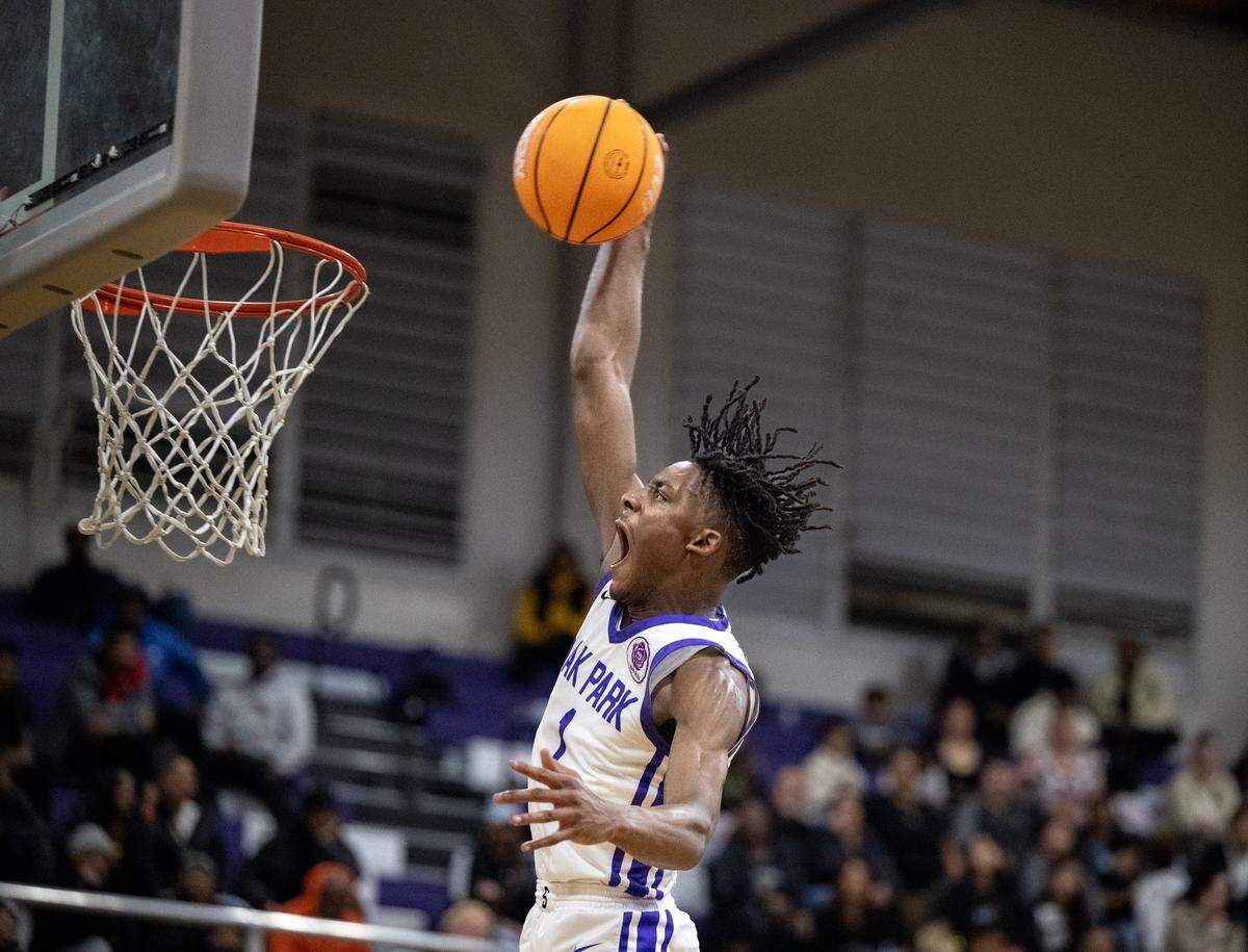 The Sacramento Dragons' William Phillips scores a basket in the first half against the Vanden Vikings on Tuesday, Feb. 3, 2026, in Sacramento.