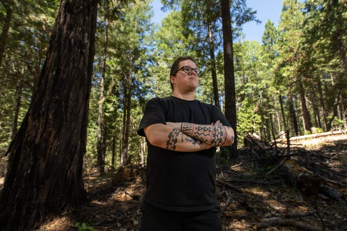 Colfax-Todds Valley Consolidated Tribe chairman Clyde Prout III, 31, stands earlier this month on the 40 acres that his tribe recently acquired on Moody Ridge near Alta. He plans some ceremonial structures for the property, which is protected as open space.