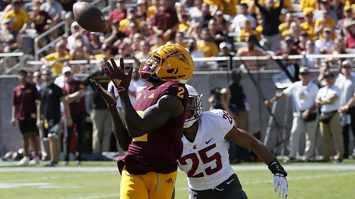 FILE - In this Oct. 12, 2019, file photo, Arizona State wide receiver Brandon Aiyuk (2) reaches out to make a touchdown catch in front of Washington State safety Skyler Thomas (25) during the first half of an NCAA college football game in Tempe, Ariz. This year’s NFL draft features a superb group of wide receivers, including Aiyuk, who are expected to make immediate impacts in the NFL. (AP Photo/Ross D. Franklin, File)