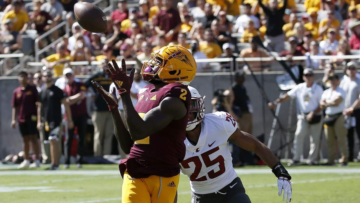 FILE - In this Oct. 12, 2019, file photo, Arizona State wide receiver Brandon Aiyuk (2) reaches out to make a touchdown catch in front of Washington State safety Skyler Thomas (25) during the first half of an NCAA college football game in Tempe, Ariz. This year’s NFL draft features a superb group of wide receivers, including Aiyuk, who are expected to make immediate impacts in the NFL. (AP Photo/Ross D. Franklin, File)