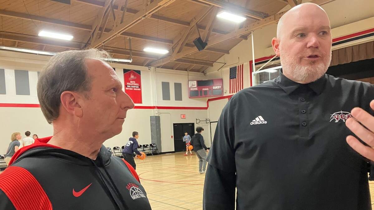 Valley Christian Academy coach Brad Gunter Jr., right, and longtime coaching pal and rival Scott Tedmon of Sacramento Adventist Academy talked basketball and life before and after VCA’s 92-87 overtime victory on Thursday, Jan. 26, 2023.