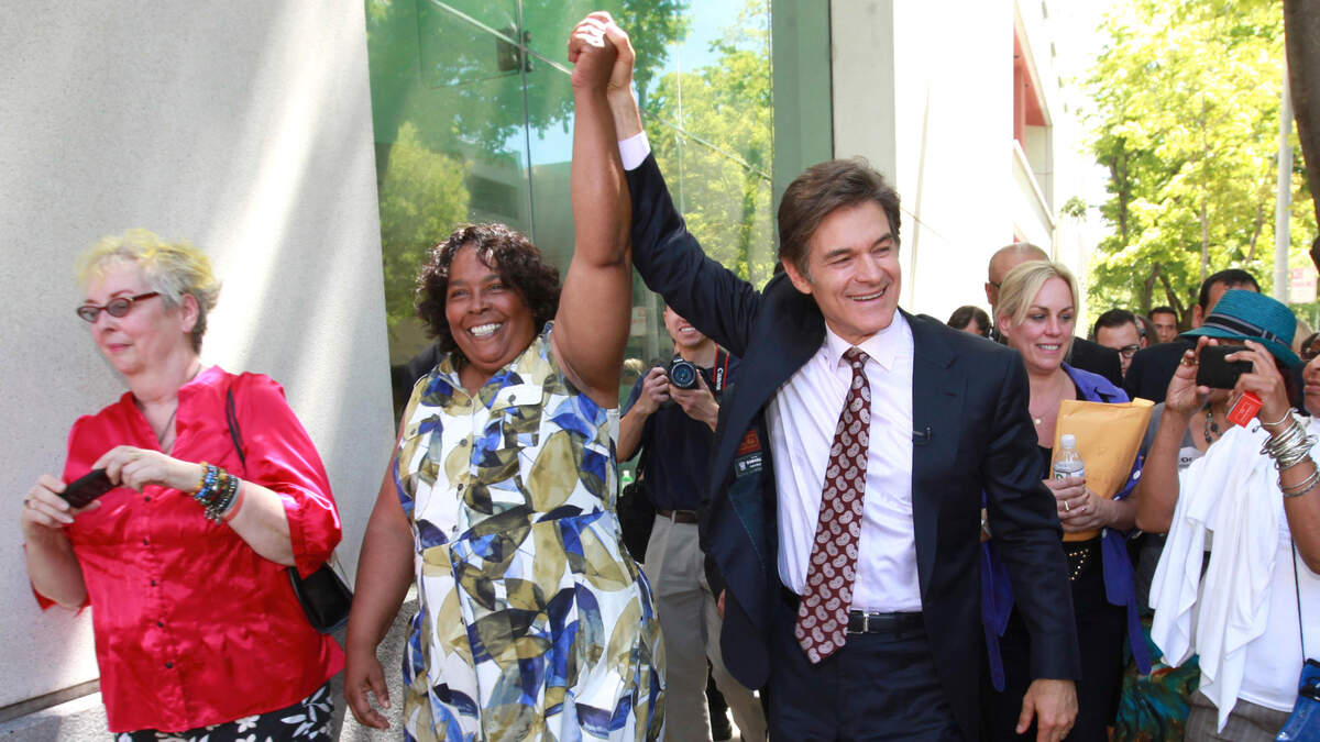 Dr. Mehmet Oz and Yvonne Walker, president of Service Employees International Union Local 1000, lead a walk for health in Sacramento in 2012.