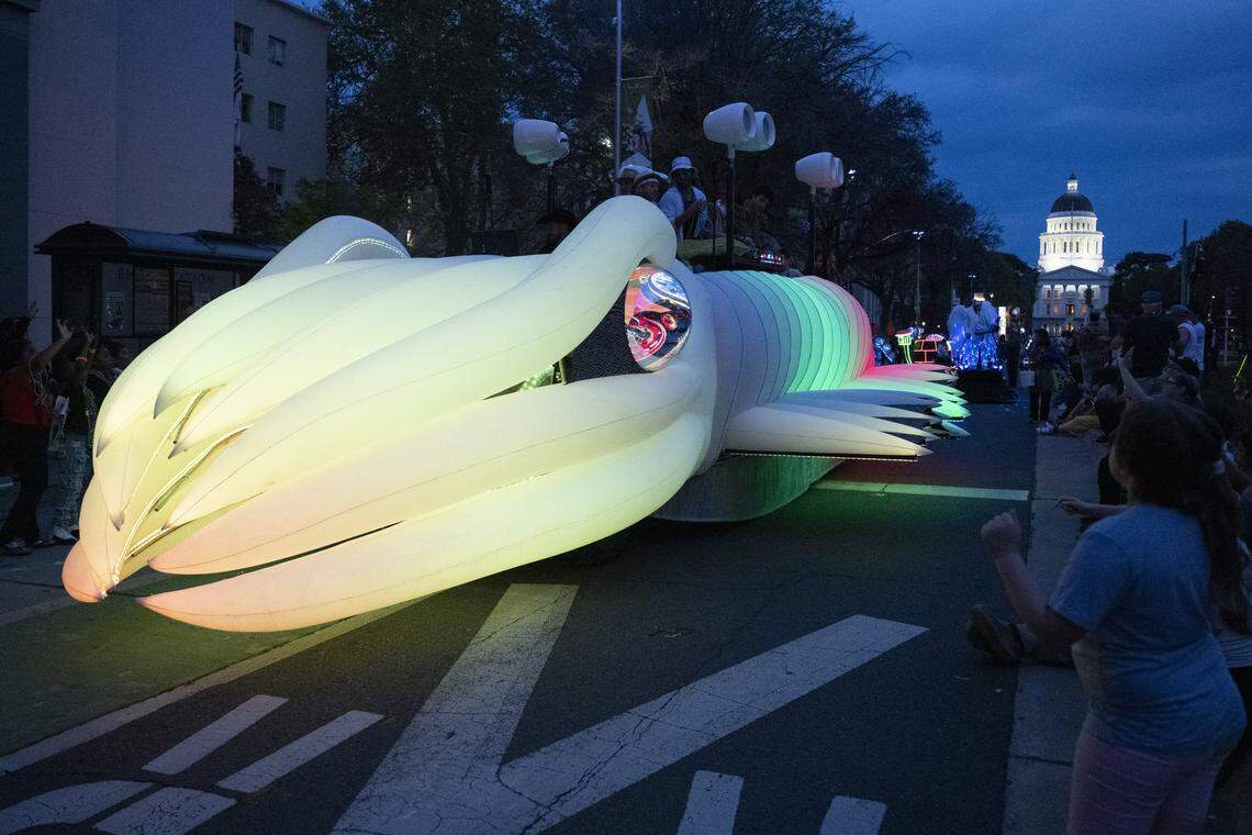 A giant cuttlefish by Dust Works parades down Capitol Mall during the City of Trees Parade in Sacramento on Saturday, Feb. 28, 2026.