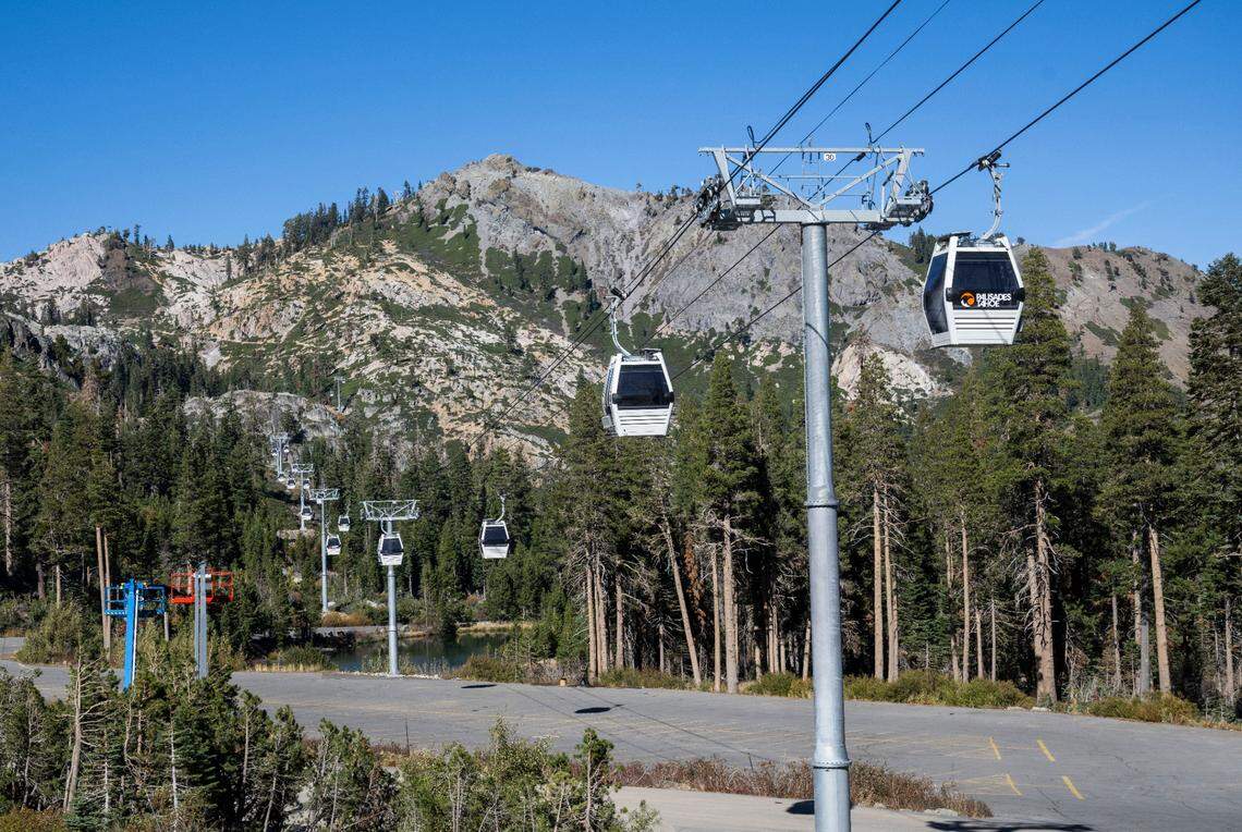 Cabins traverse the Base-to-Base Gondola route from Alpine Lodge during construction in October. A 16-minute trip takes skiers and snowboarders to the Olympic Valley side of Palisades Tahoe, travel previously done by car or bus.