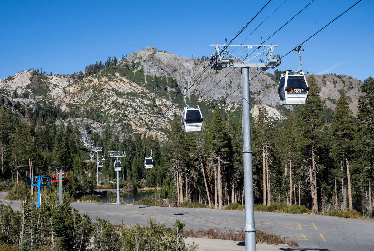Cabins travese the Base to Base Gondola route from Alpine Lodge during construction on Thursday, Oct. 27, 2022, during construction. A 16-minute trip will take skiers and snowboarders to the Olympic Valley side of Palisades Tahoe, travel previously done by car or bus.