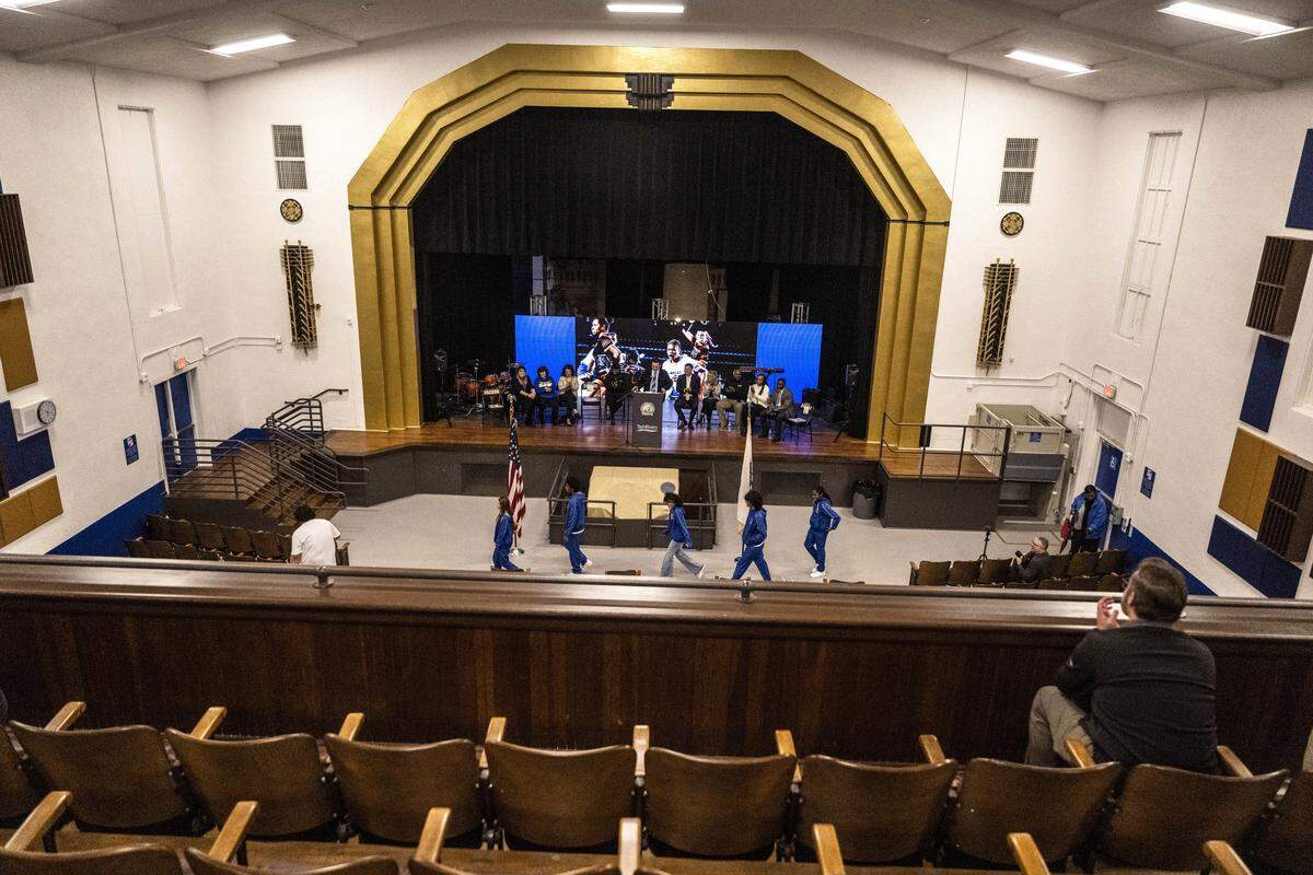 Steve Martinez, Twin Rivers Superintendent, welcomes the Grant Union High School drumline during the unveiling of the restoration of the school’s auditorium on Monday.