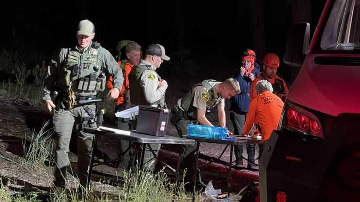 Deputies and search and rescue personnel coordinate operations at Little Truckee in the Tahoe National Forest on Sunday, June 28, 2026, as they prepare to search for a missing 83-year-old hiker. Searchers found the woman before planned air search operations began, and authorities reported she was not injured.