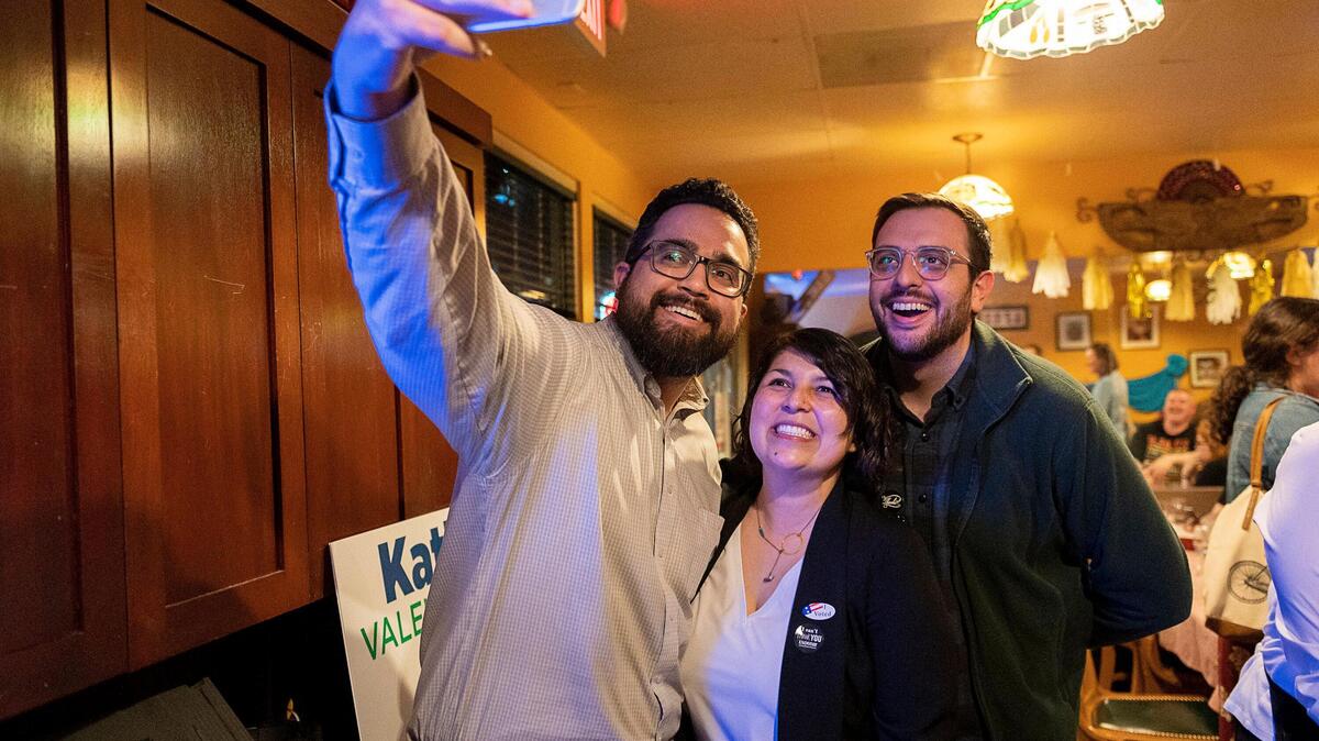 District 4 city council candidate Katie Valenzuela takes a selfie with supporters during her election night party at Vallejos on March 3, 2020 in Sacramento. The Bee’s youngest Editorial Board members say youth voting still lacks because their issues and candidates aren’t valued in the political system.