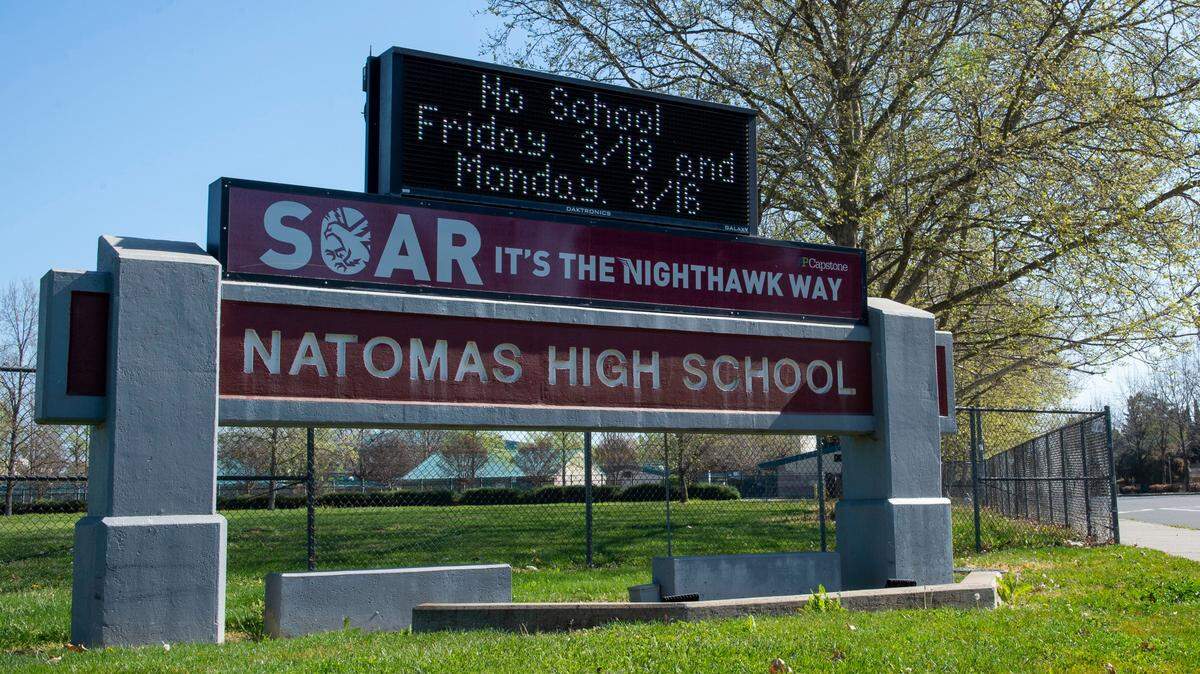 A sign at Natomas High School indicates that the school is closed on Friday, March 13, 2020. District officials said Thursday that no one in Natomas Unified had been diagnosed with the coronavirus, but said that at least one student came to Natomas High on Thursday with potential symptoms. The district-wide shutdown was planned to end Monday, but the reopening was postponed Friday afternoon when the Sacramento County Office of Education announced all public schools would close for at least two weeks.