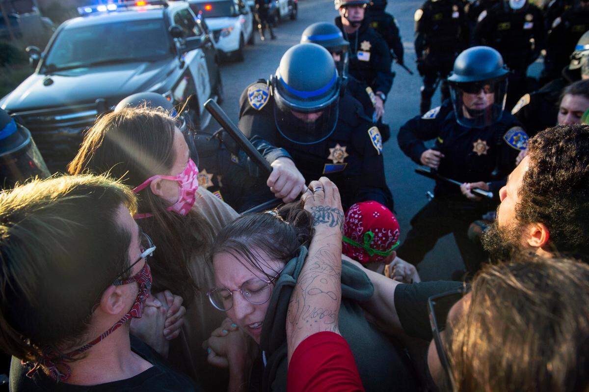 CHP officers clash with protesters as they try to march on Interstate 5 in downtown Sacramento on Saturday, May 30, 2020. Protesters reacted on Saturday to the death of Minneapolis man George Floyd.