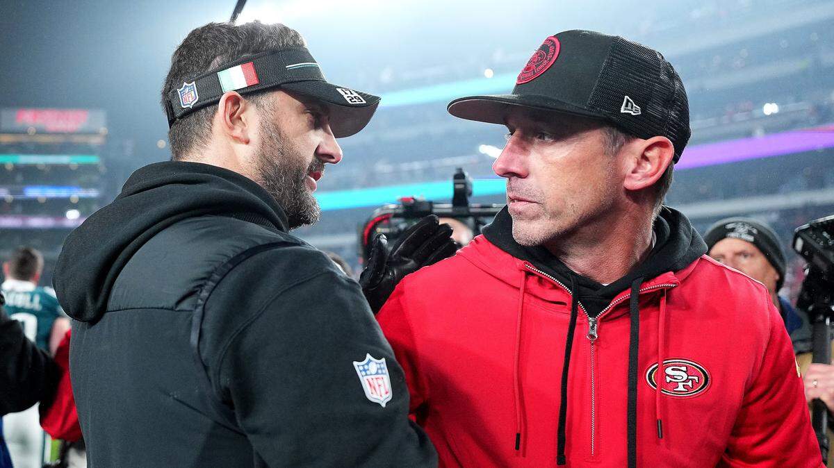 PHILADELPHIA, PENNSYLVANIA - DECEMBER 03: Head coach Nick Sirianni of the Philadelphia Eagles and head coach Kyle Shanahan of the San Francisco 49ers embrace after the game at Lincoln Financial Field on December 03, 2023 in Philadelphia, Pennsylvania. (Photo by Mitchell Leff/Getty Images)