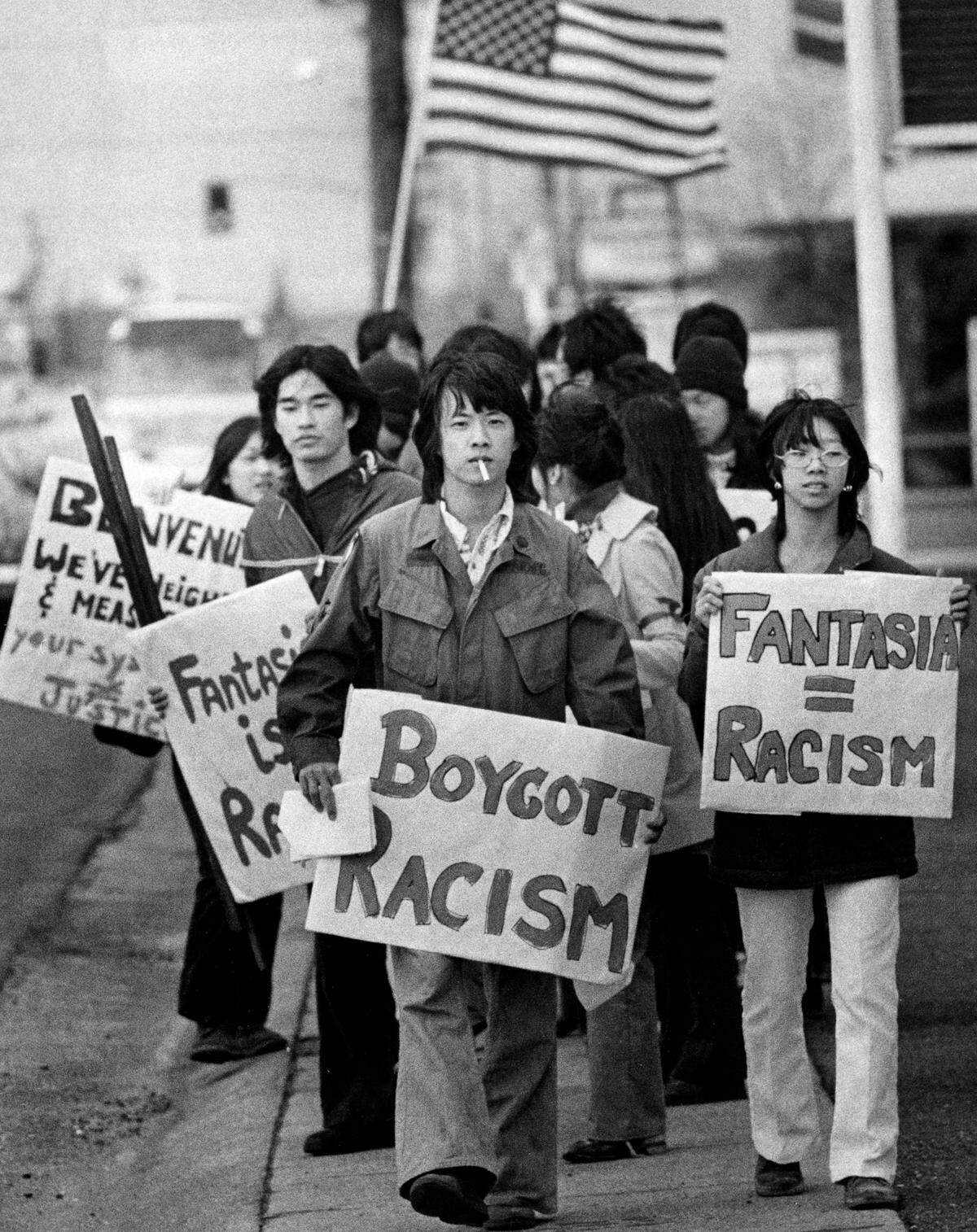 Picketers march to against signs depicting racist Asian caricatures and pidgin English at the Fantasia Miniature Golf Course at 3421 Arden Way on Sunday, March 3, 1974. Protests over the signs began in 1971, and owner Dan Benvenuti made changes to 10 signs in 1972. In a “sidewalk agreement” on Sunday, Benvenuti and the protestors agreed to terms leading to the removal of the rest of the signs.