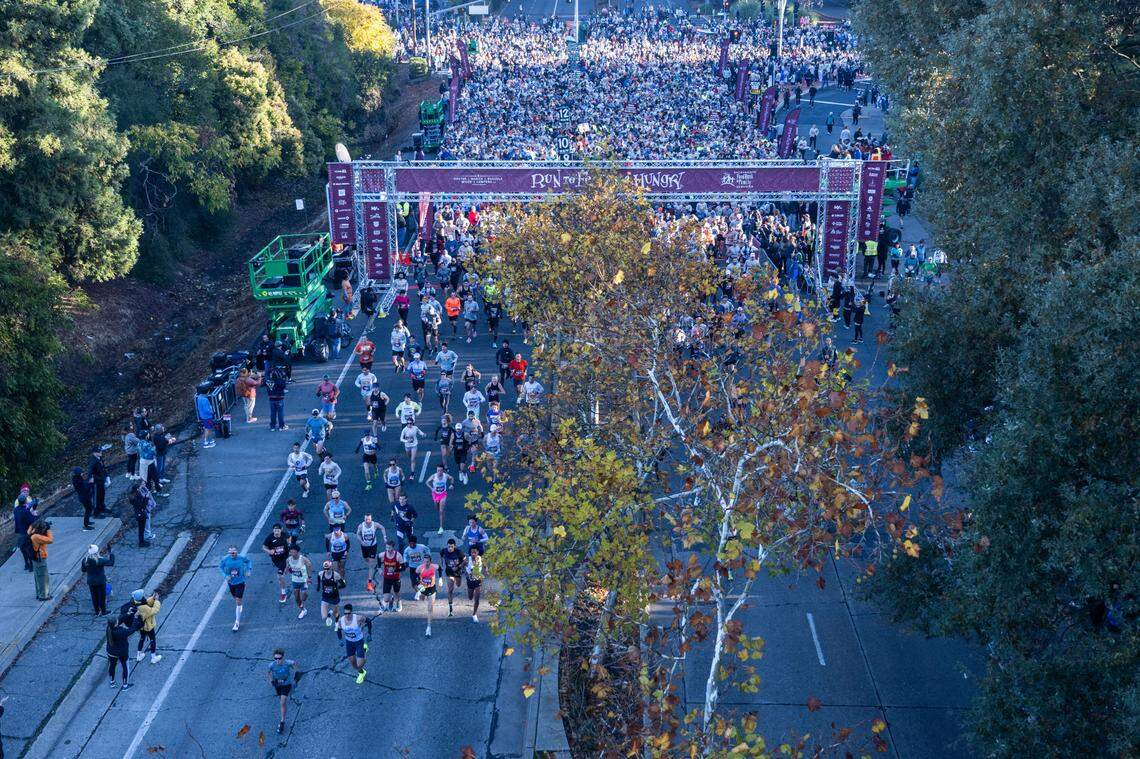 Participants of the Run to Feed the Hungry start the course on Thursday in East Sacramento.