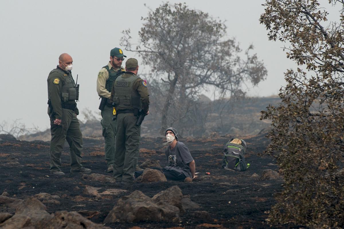 During the Camp Fire, a man is arrested for being in a mandatory evacuation zone in Paradise in 2018. He said he was trying to get home from a church where he’d been sleeping.