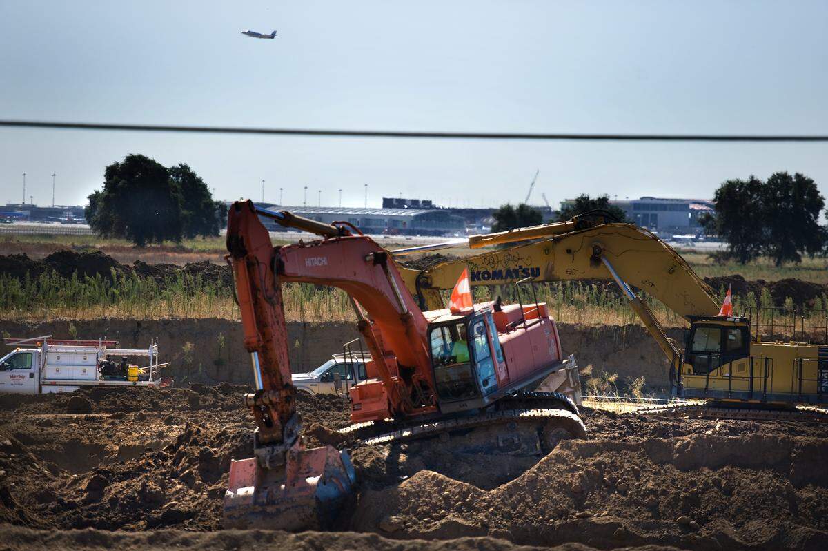 A large trench is dug for a levee wall along Garden Highway, protecting the area from the Sacramento River when it reaches flooding stage, as part of the Natomas Levee Improvement Program in 2010.