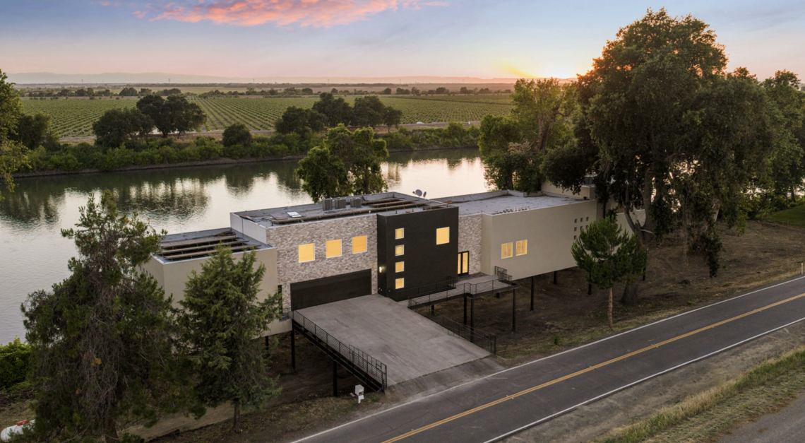 Modern Sacramento River waterfront mansion features private dock