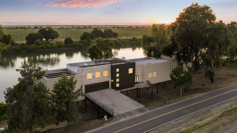Modern waterfront mansion with dock offers Sacramento River lifestyle