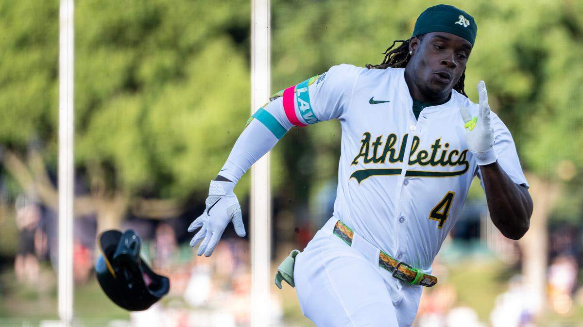 Athletics outfielder Lawrence Butler (4) runs the bases on a inside-the-park home run off Atlanta Braves pitcher Didier Fuentes (75) in the bottom of the first inning Tuesday at Sutter Health Park in West Sacramento.
